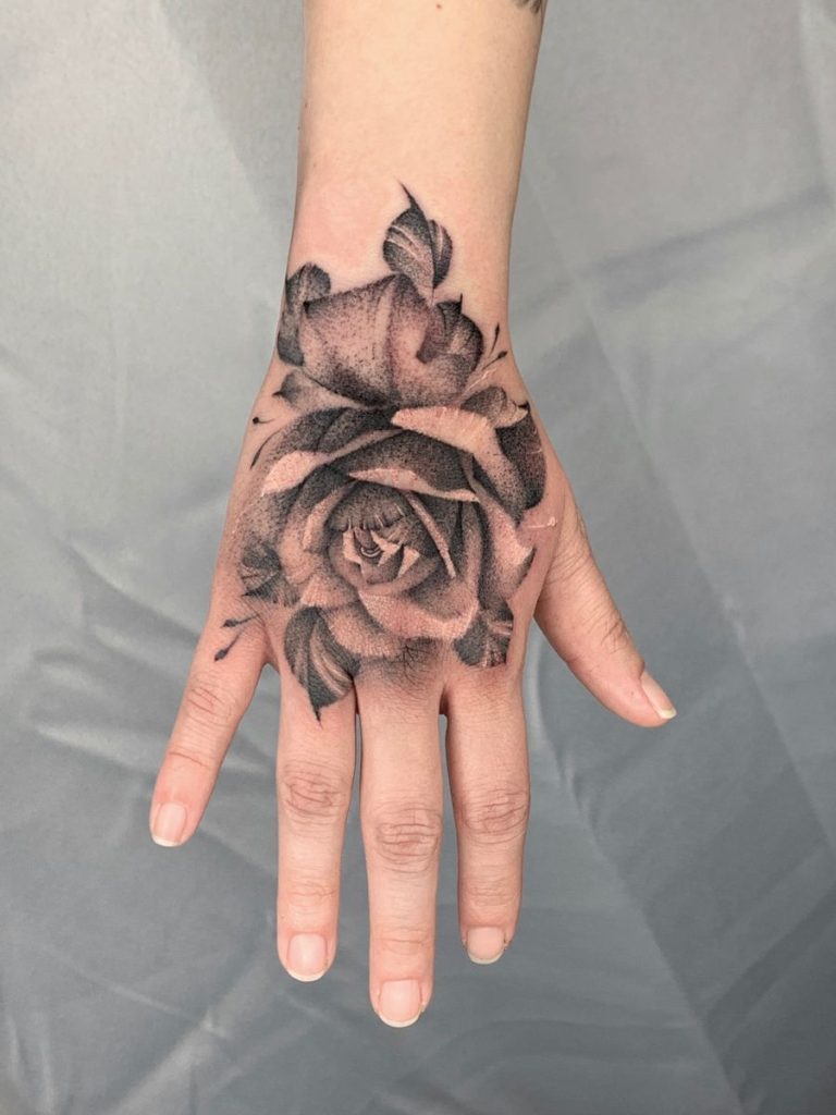 25 Rose Hand Tattoo Ideas To Inspire Your Next Bold And Stylish Ink ...