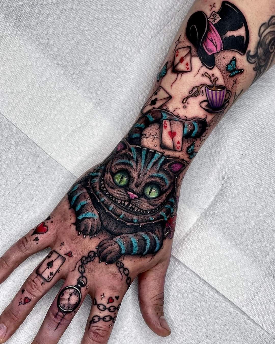 25-cheshire-cat-tattoo-ideas-for-wonderland-lovers-unique-alice-in